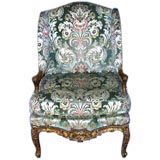 French 19th century finely carved and parcel gilt winged bergere
