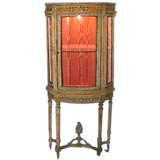 19th century carved bow-front glass vitrine
