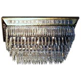 Antique Art Deco tiered crystal ceiling fixture.