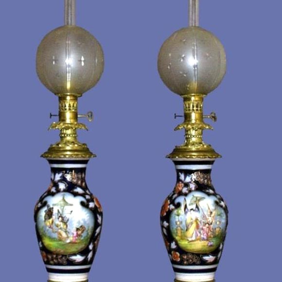 Pair of fine French 19th century Bayeaux Paris porcelain hand-painted oil lamps with original frosted globes.  The lamps have scenic fairy tale oriental figures.<br />
FOR MORE INFORMATION, PLEASE VISIT WWW.CONNOISSEURANTIQUES.COM