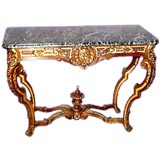 French 19th century carved walnut and parcel gilt console French 19th century carved walnut and parcel gilt console
