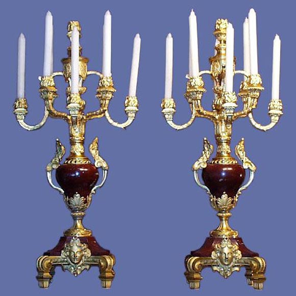 Pair of large French 19th century bronze dore and deep Rouge marble 8-light candelabrum with flamed candleholders and heavy bronze dore mounts.<br />
FOR MORE INFORMATION, PLEASE VISIT WWW.CONNOISSEURANTIQUES.COM