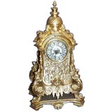 Large French 19th century mercury bronze dore clock on base