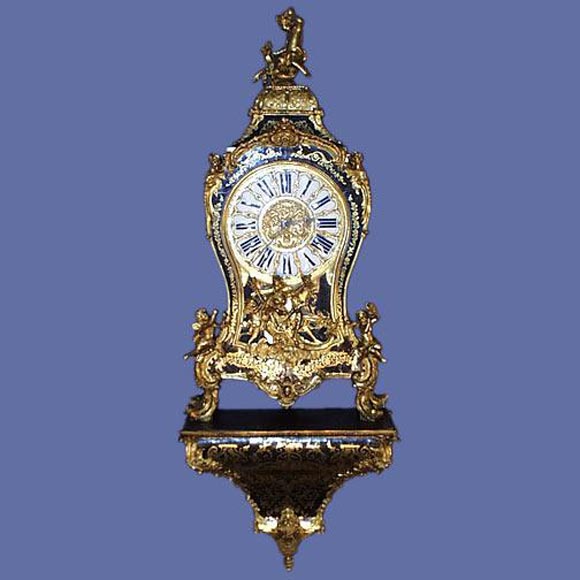 Magnificent French 19th century boulle clock on wall bracket with finely detailed inlaid brass in tortoise and highly detailed bronze dore mounts and appointments.<br />
FOR MORE INFORMATION, PLEASE VISIT WWW.CONNOISSEURANTIQUES.COM