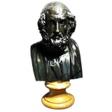 19th century patinated bronze bust of Homer on a marble base.