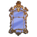 French early 19th century carved and gilt panelled mirror