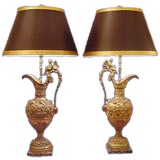 Pair of French bronze allegorical urns