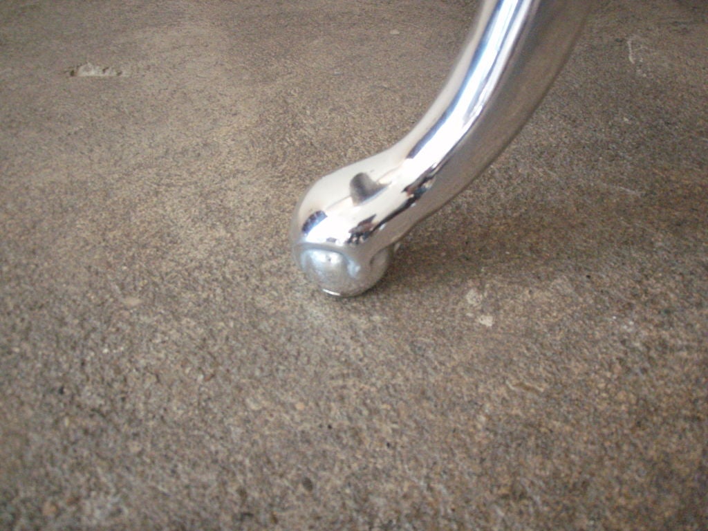 Soft dark brown leather with chrome claw foot legs.  Seat height is 20.5