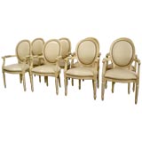 Set of Eight  Dining Chairs with Arms.