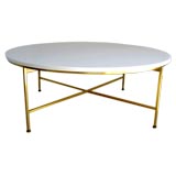 Round White Vitrolite and Brass Table designed by Paul McCobb