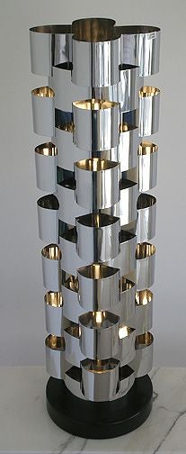 Sculptural metal table lamp by Curtis Jere. Polished chrome. Two bulbs.
