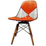 Vintage Wood Base Swivel Chair by Ray and Charles Eames
