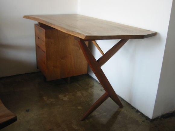 Fantastic Conoid desk custom made by George Nakashima, with matching New chair.  The desk top lifts off and can be reversed, so that the drawers are accessible to the left or right.