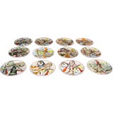 Set of twelve signed Fornasetti dish