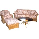 Vintage Exceptional rattan sofa and lounge chair with foot stool