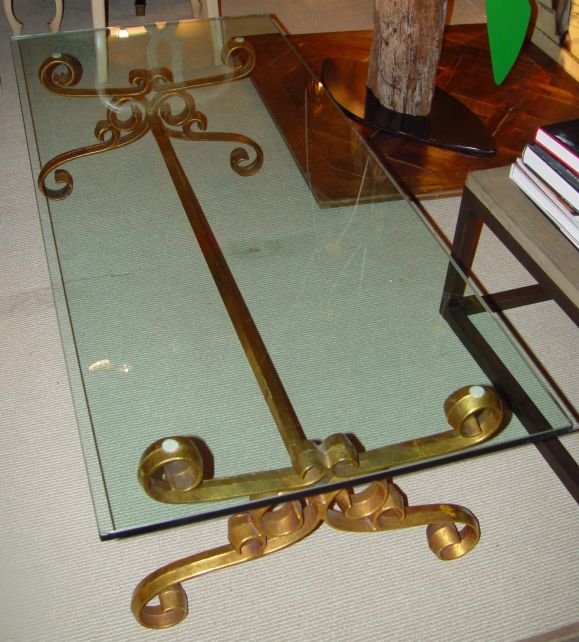 A gilt iron rectangular coffee table