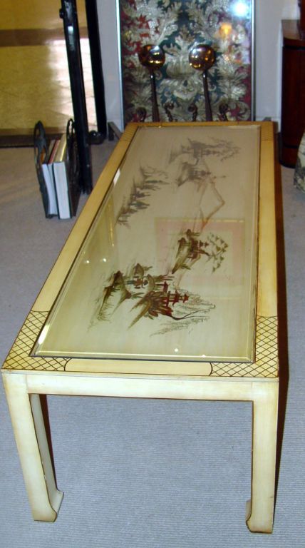 Elegant 1940's english lacquer coffee table with Asian Decor.