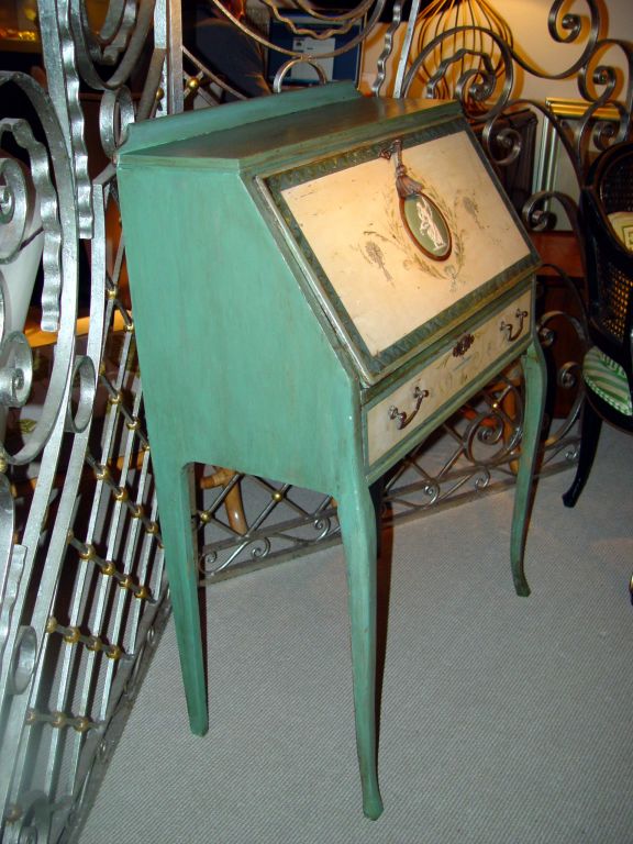 Elegant green-blue patinated secretary desk with a ceramic relief  medallion called 