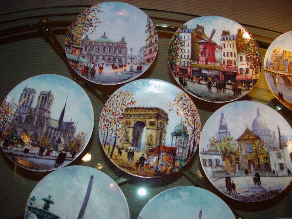 A set of 12 Porcelain de Limoges plates