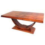 A well-figured French Art Deco Walnut Dining Table