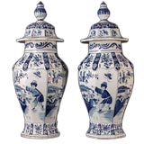 A Superb Pair of Dutch Blue & White Covered Vases