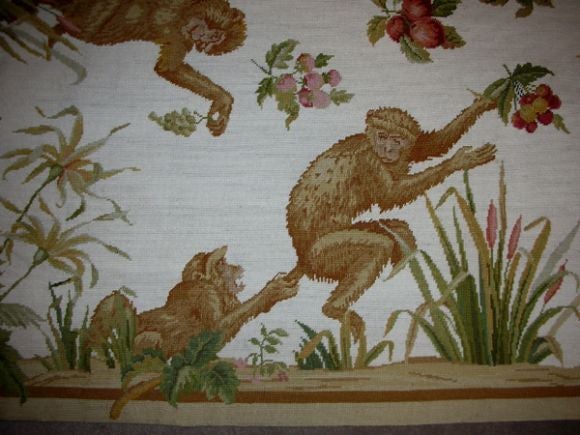 A Whimsical French Embroidered Panel of Playful Monkeys