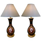 Pair of French Hand-Painted Black Porcelain Lamps with Gold and Coral Highlights
