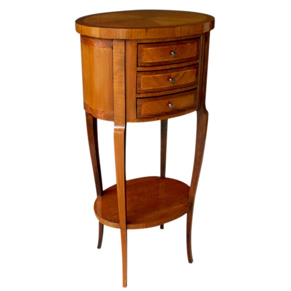 A French Louis XV Pearwood & Walnut Inlaid Oval Table