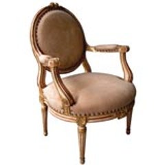 A Large-Scaled French Louis XVI Style Ivory Painted and Parcel Gilt Oval Back Open Armchair 2