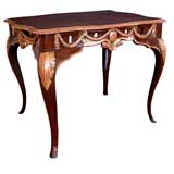 A Danish Rococo Rectangular Elmwood and Parcel-Gilt Center Table