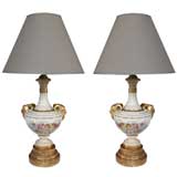 A Painted Pair of English Royal Worcester Bisque Porcelain Lamps
