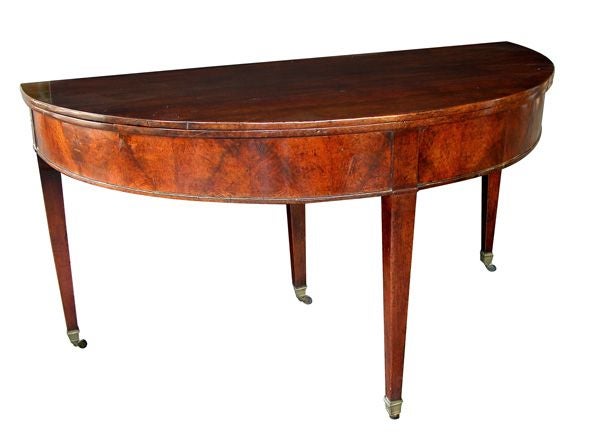 An English George III Walnut Demi-Lune Folding Dining Table