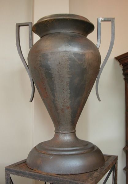 A Monumental Pair of American Art Deco Double-Handled Iron Urns on Later Stands 1