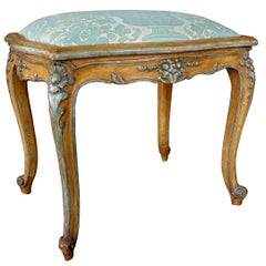 A French Louis XV Ochre Painted Serpentine-Form Stool with Celadon Highlights