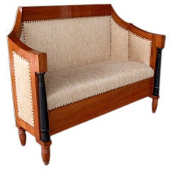 Antique A Handsome and Warmly Patinated German Biedermeier Cherry Wood Settee with Ebonized Highlights