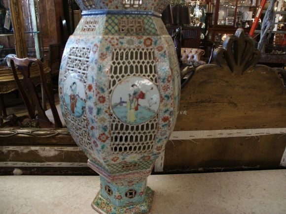 Great looking large porcelain with fine details and it is two stacking pcs.  The bottom is fitted with a light socket but it is not drilled.