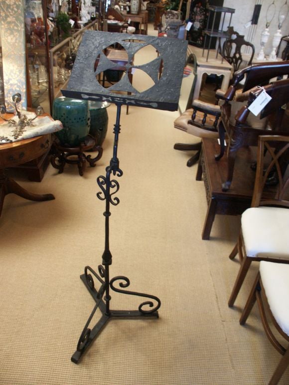 Wonderful old wrought iron music stand or bible stand with great rococo lines.