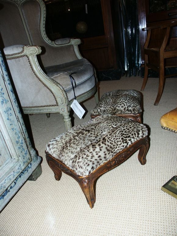 Verry pretty pair of French country foot stools with vintage leopard fur cover.