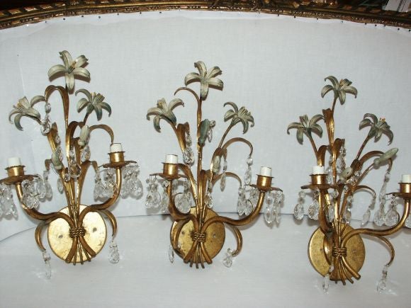 Set of Three Gilt Metal and Crystal Floral Sconces