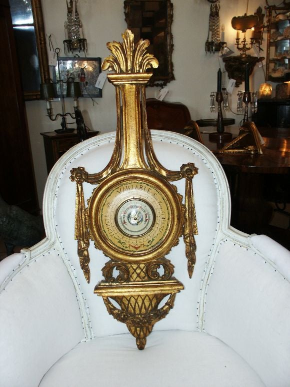 Great looking barometer in carved giltwood Italian and from the 50's or 60's.