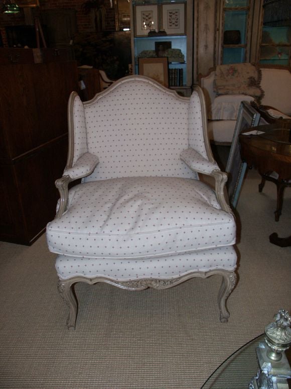 Nice quality carved wood arm chair with white washed finish