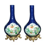 Pair of Bronze Mounted Blue Vases With Famille Rose