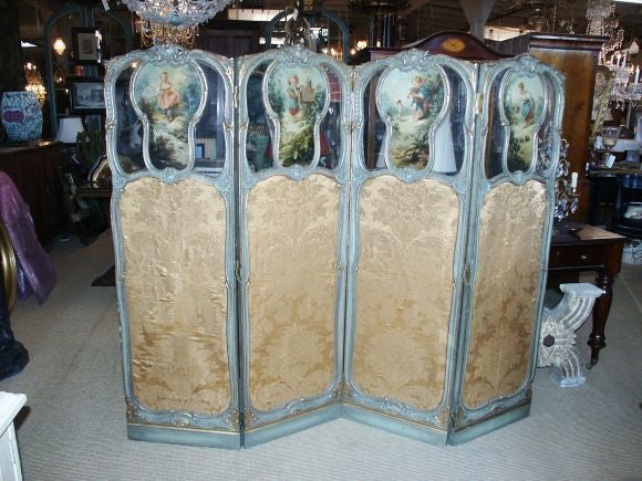 Beautiful carved wood and glass screen with four panels,  each with a very well done French painting.