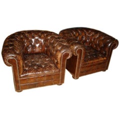 Pair of Leather Tufted Arm Chairs
