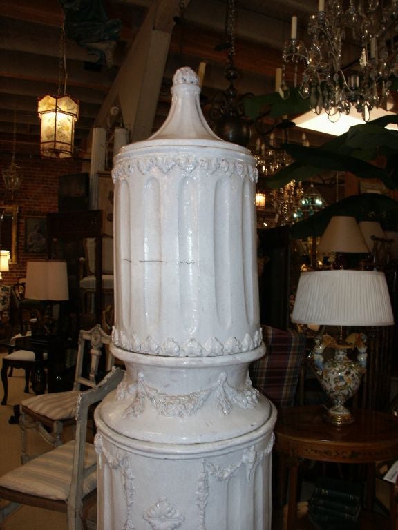 Great large white glazed stove with five stacking sections ****total distance around the ouside of the base is 100