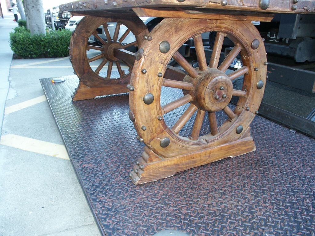 20th Century Rustic Cowboy Style Wagon Wheel Table and Benches