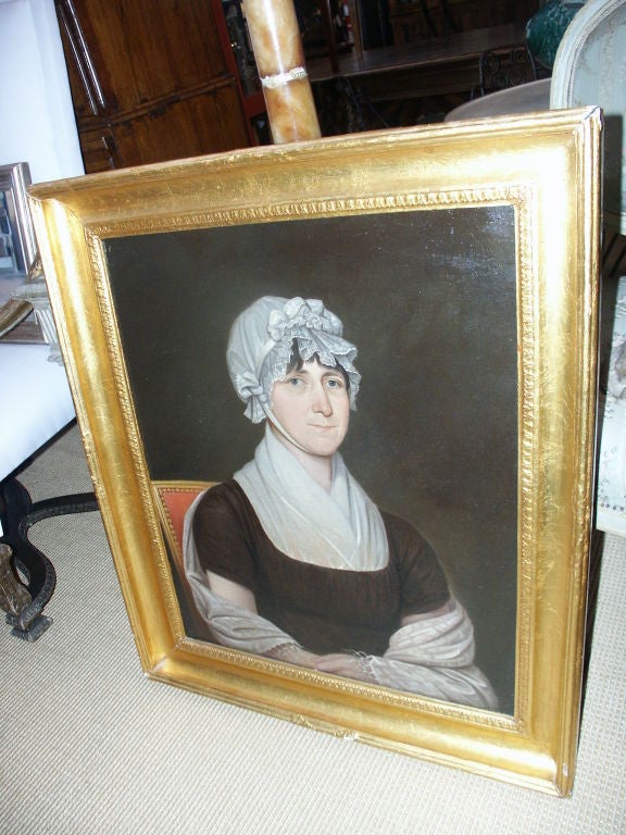 Great looking Primitive American unsigned painting.  The frame has been re-worked and the stretchers are original on the painting but the canvas is relined.
