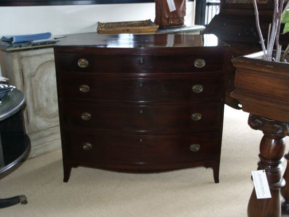 Great bow front chest of drawers with nice clean lines.  This pc. has 4 nice sized drawer with great antique hardware.