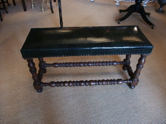 Turned oak bench with new faux croc. leather covering.