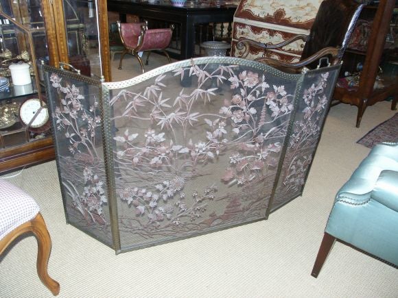 Very unusual firescreen with applied metal bamboo design.